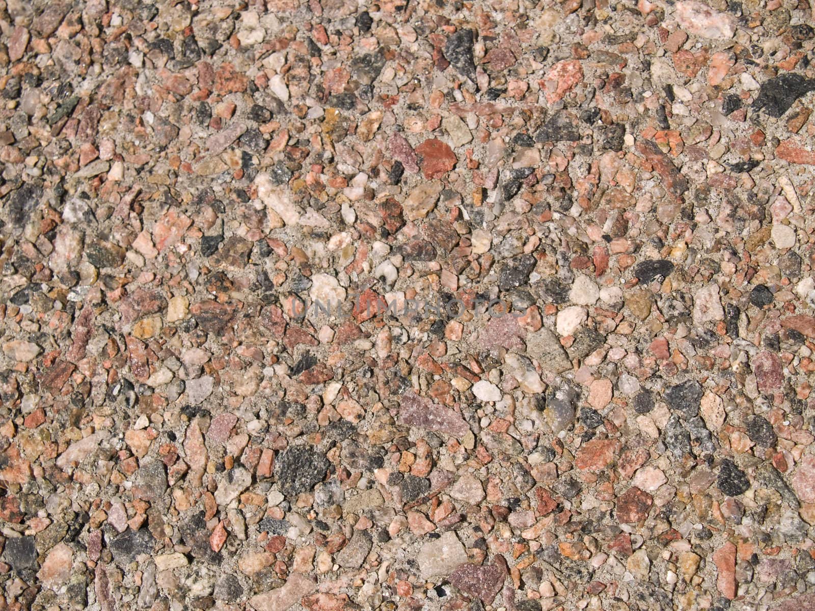 Tile covered by a granite crumb.