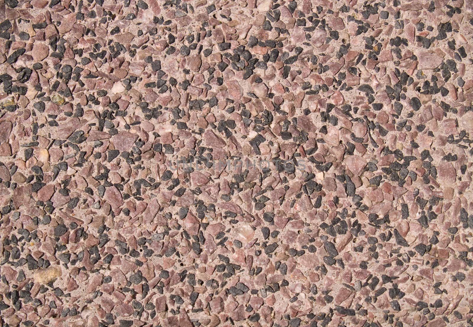 Tile covered by a granite crumb.