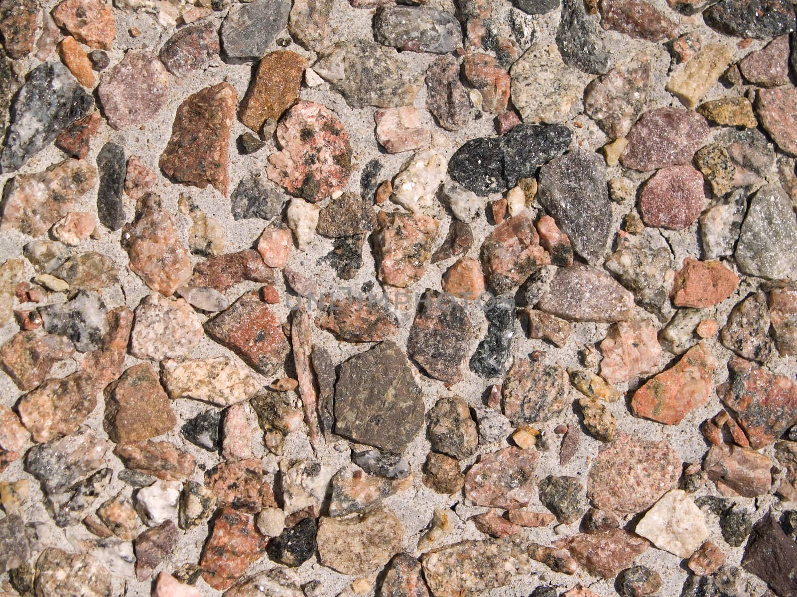Tile covered by a granite crumb. shot close-up which can be use as background or texture