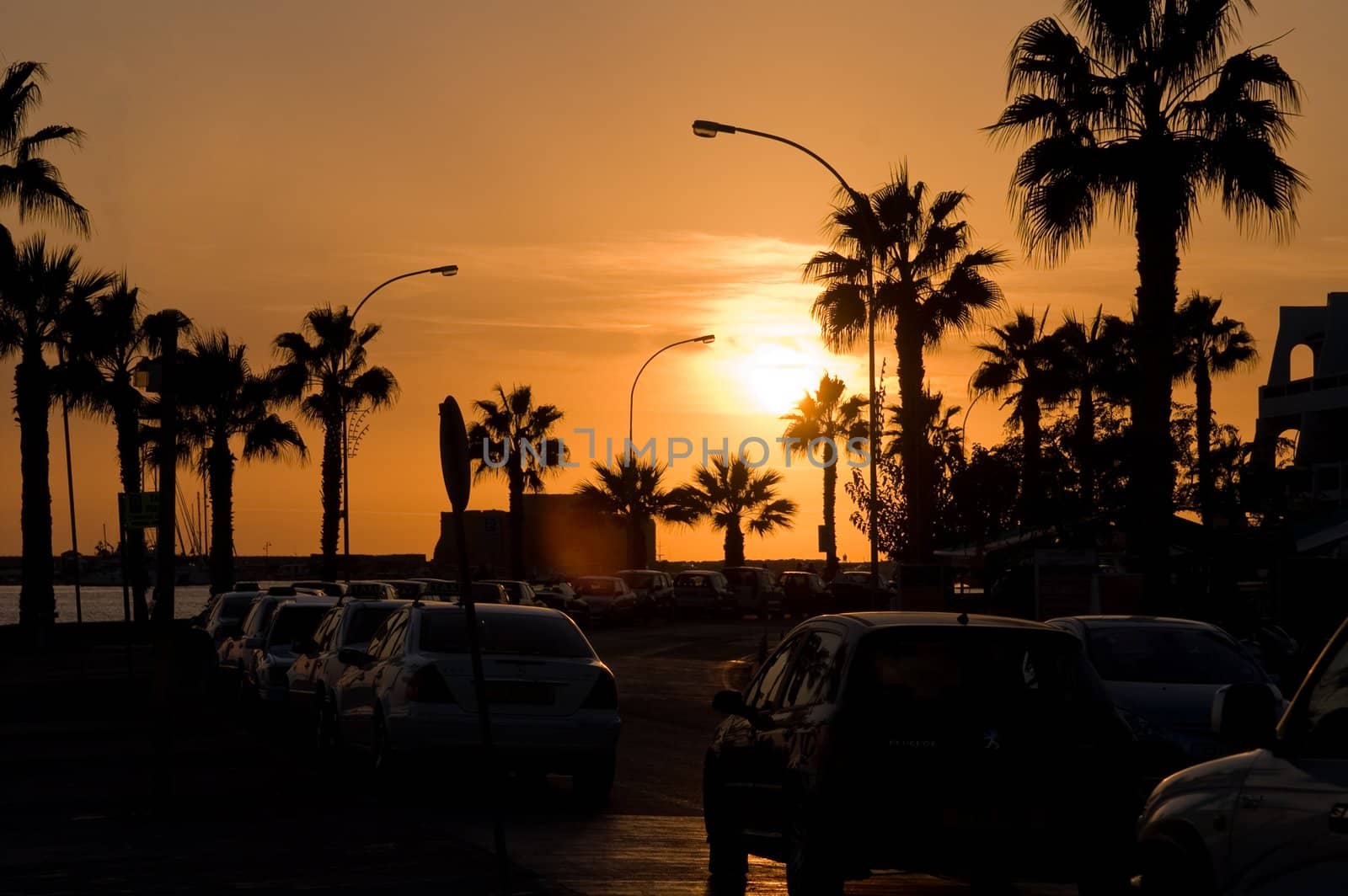 Orange urban sunset by lilsla