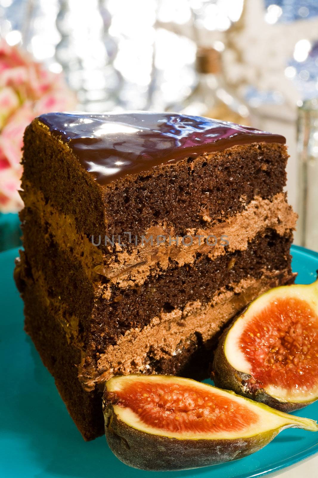 Slice of chocolate cream cake with guava fruit