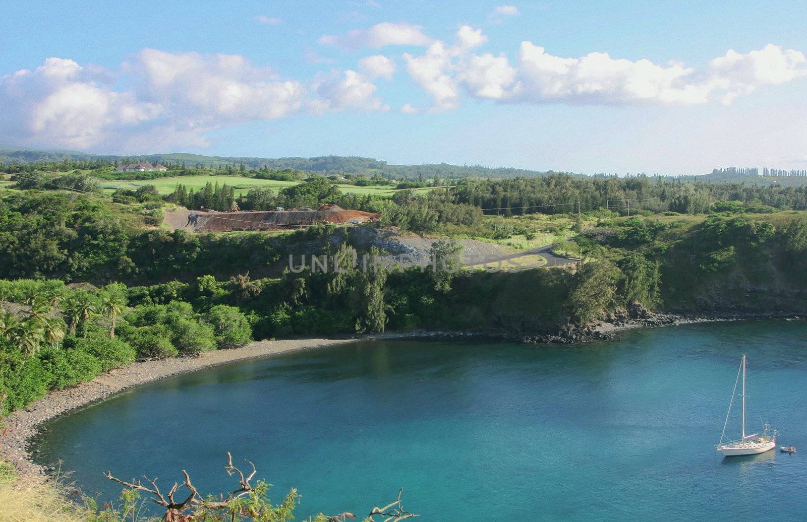 Honolua Bay with white clouds in the background