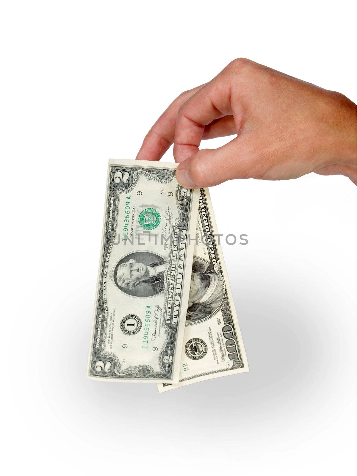 dollars in hand on white background