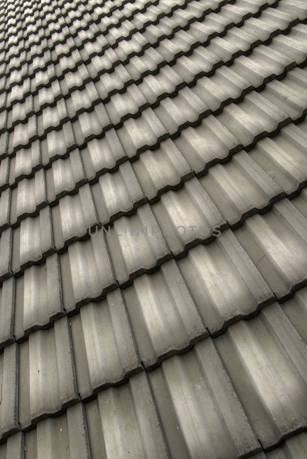 Abstract pattern of tile on roof of building.