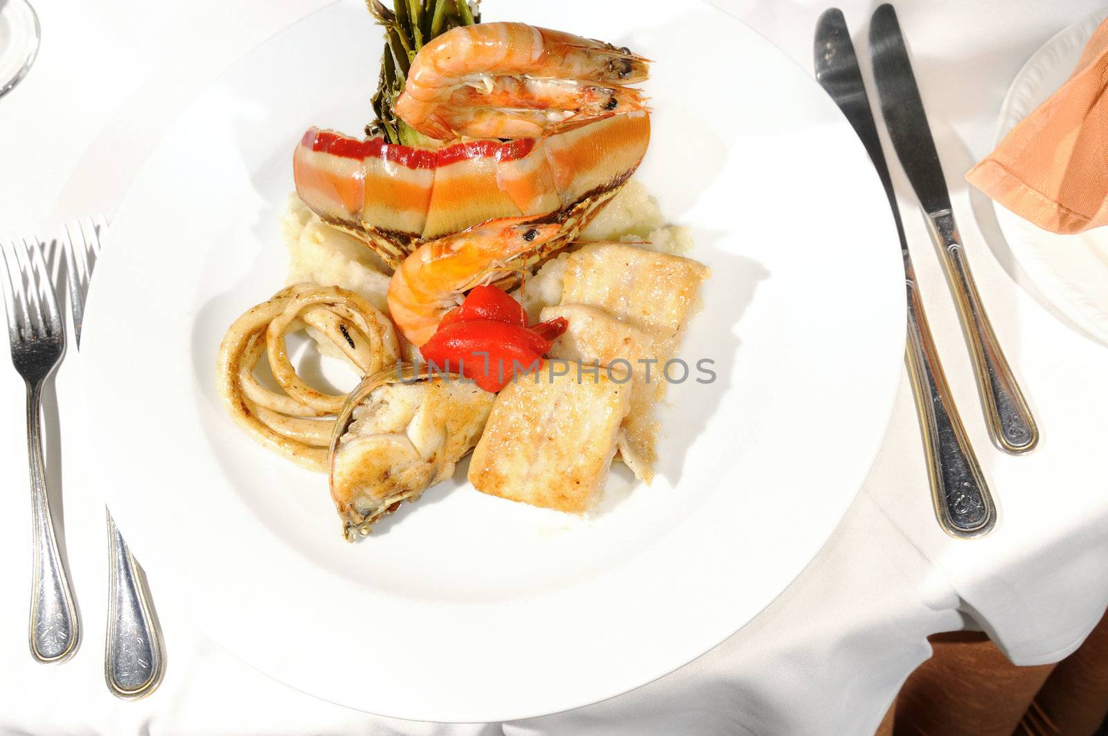 Delicious prawns and lobster on luxury restaurant table