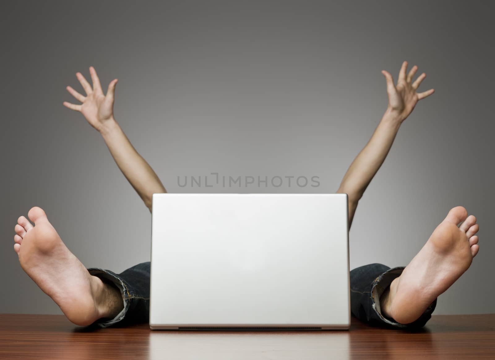 Happy Human behind a computer in an office