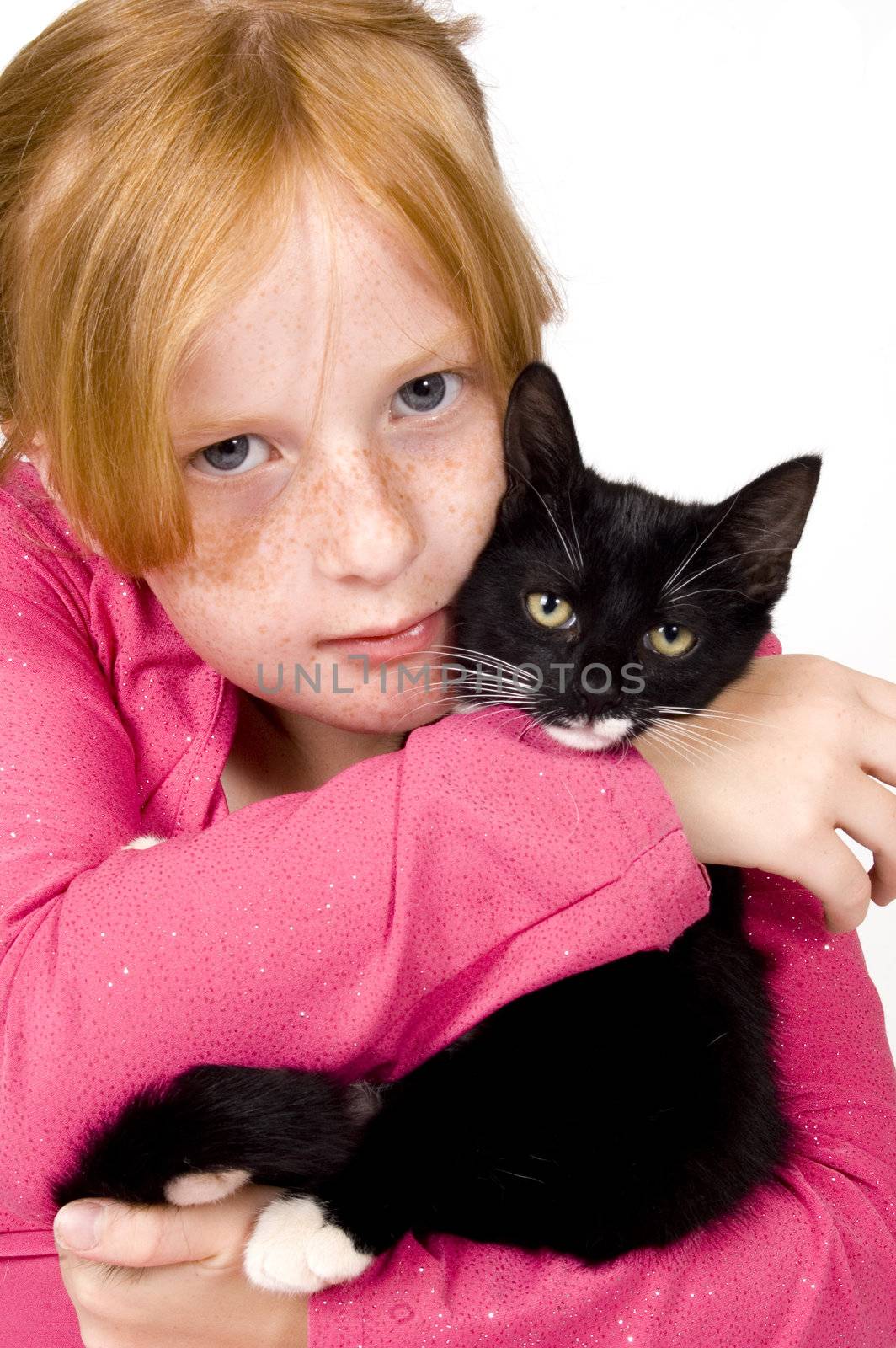 close up of girl and kitten