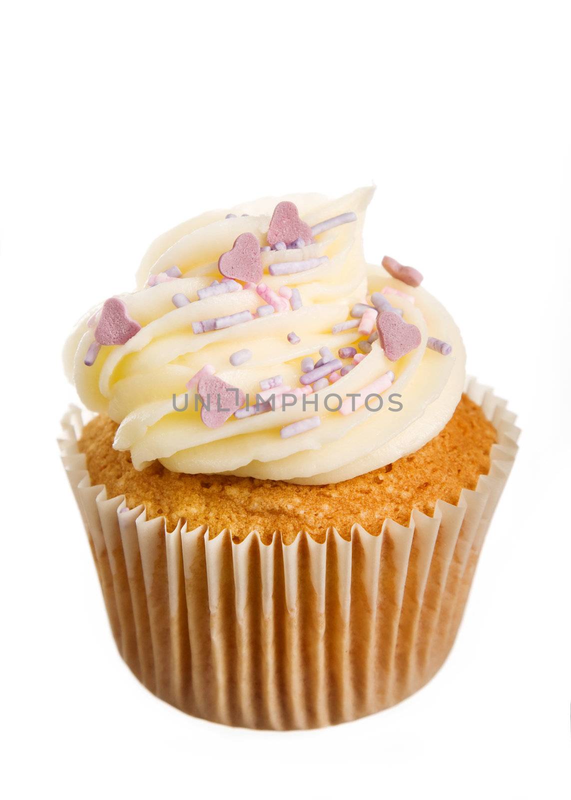 Cupcake decorated with frosting and purple sprinkles