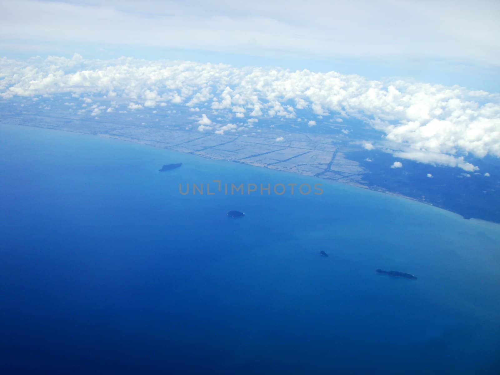 a top view from sky - island, sea, ocean