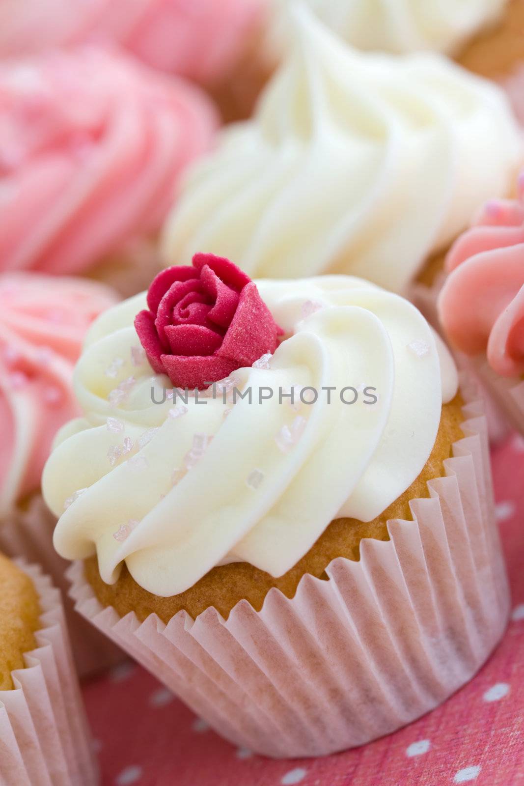 Assortment of pink and white cupcakes