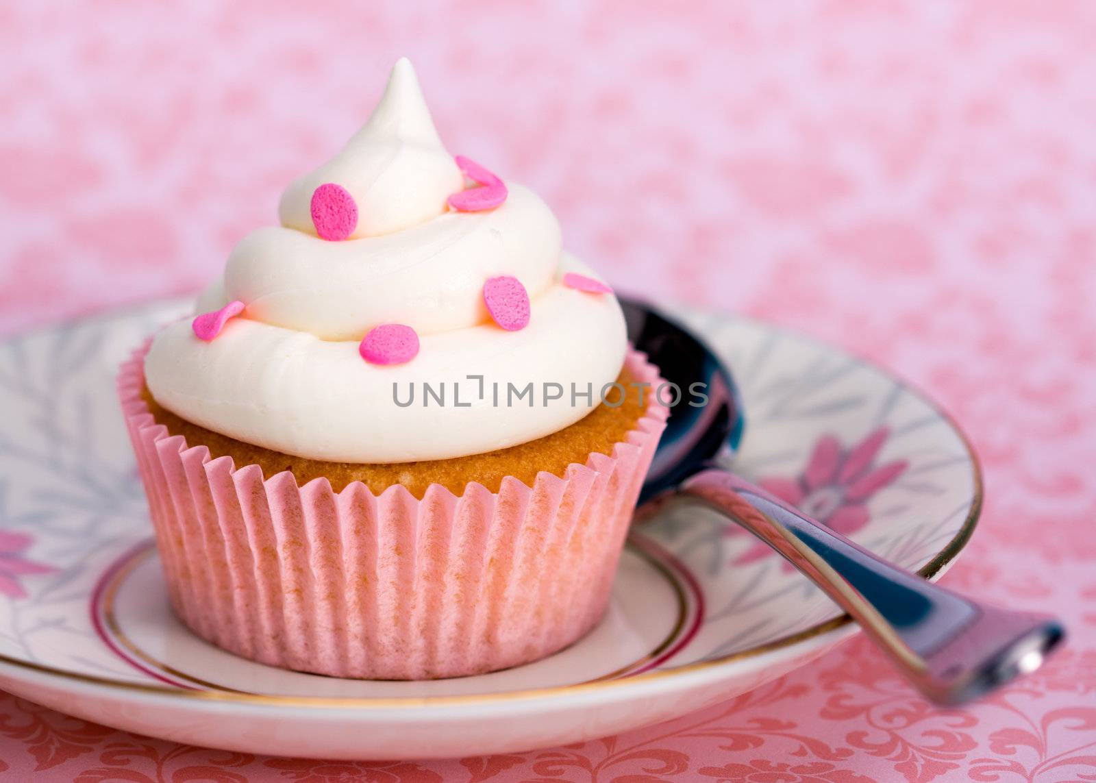 Pink cupcake, ready to eat