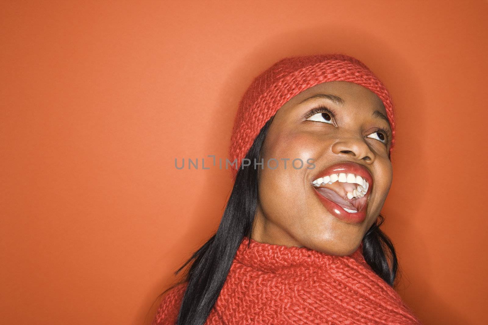 Woman laughing. by iofoto
