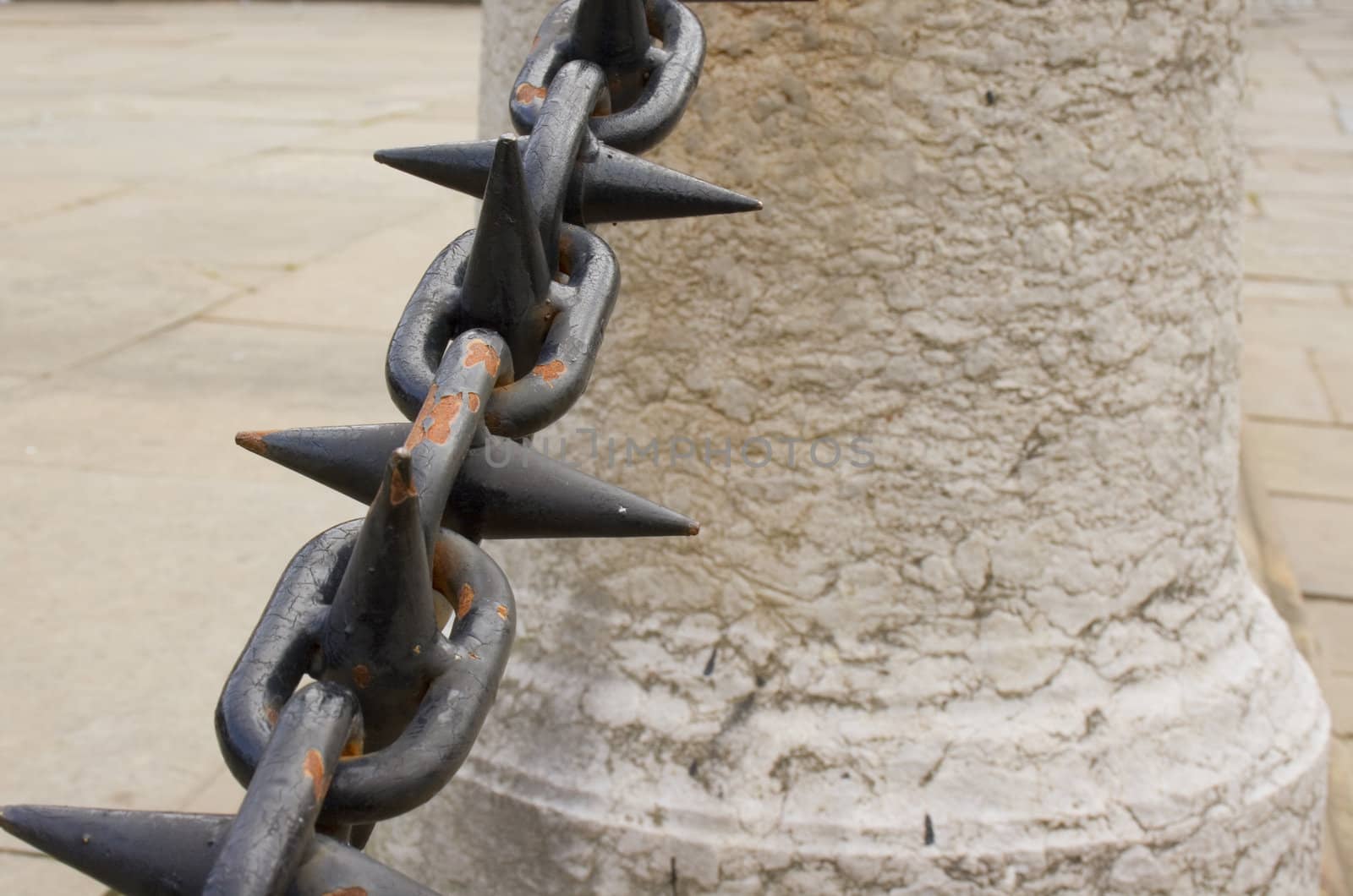 Close up of rusted spiked iron railings