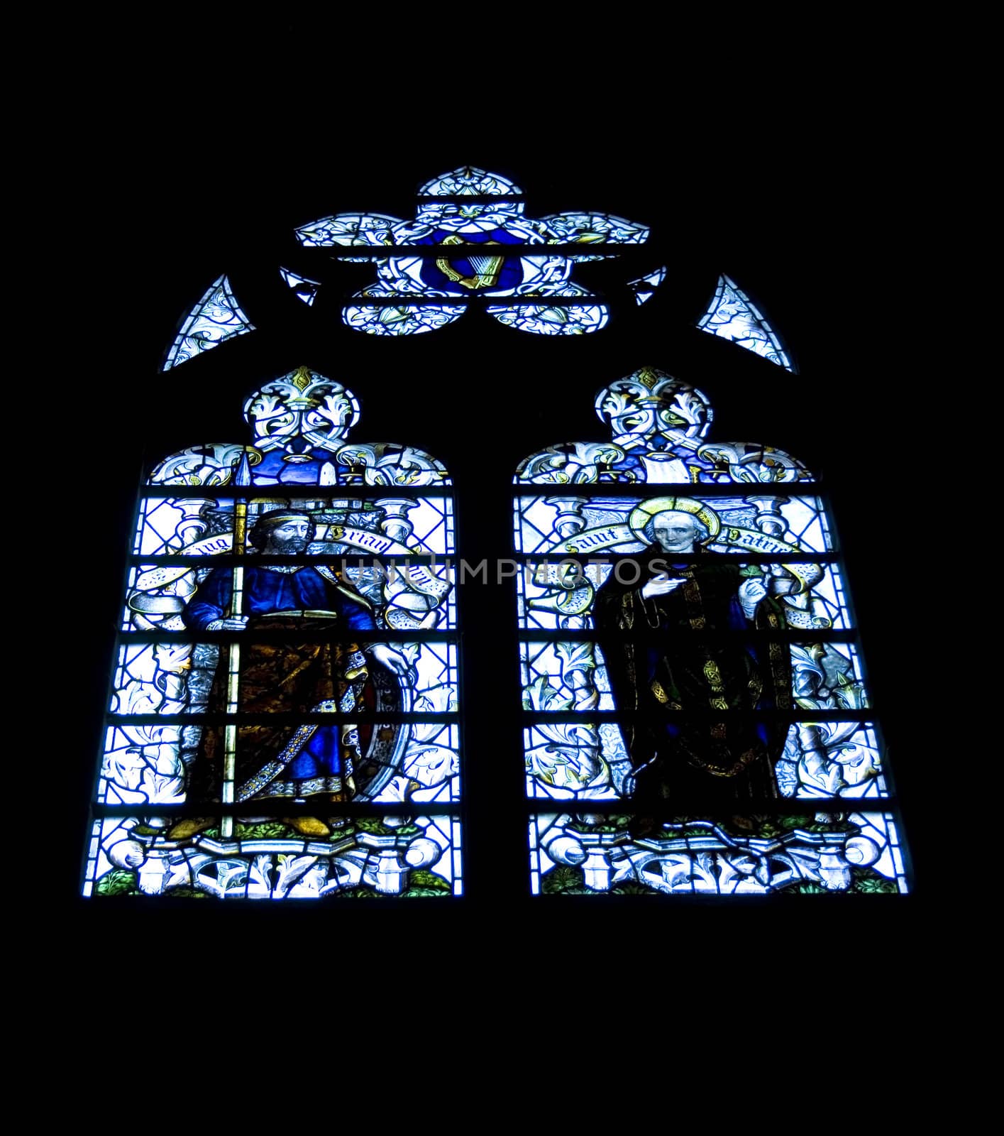 Pair of arched stained glass windows