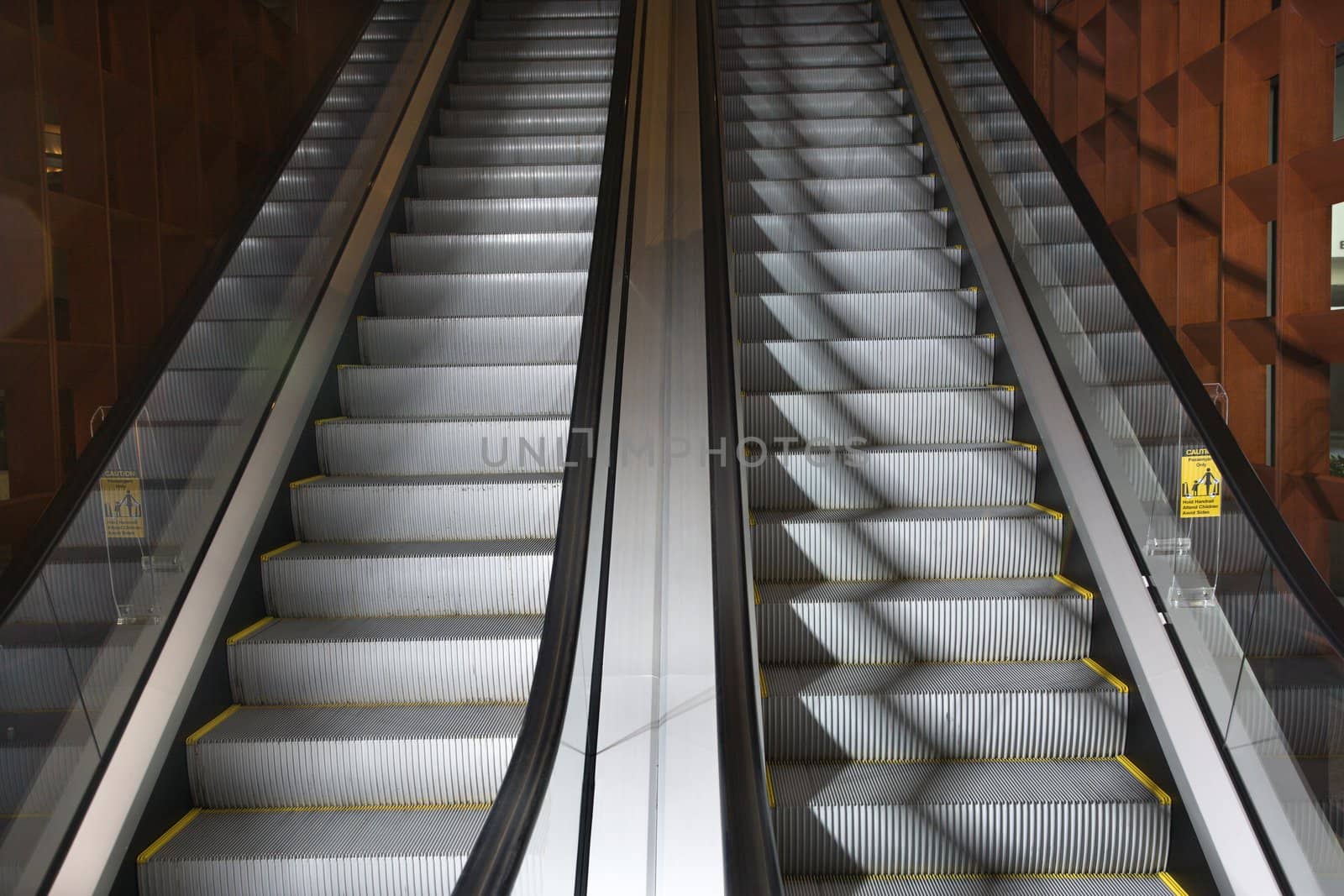 Ascending and descending escalators.