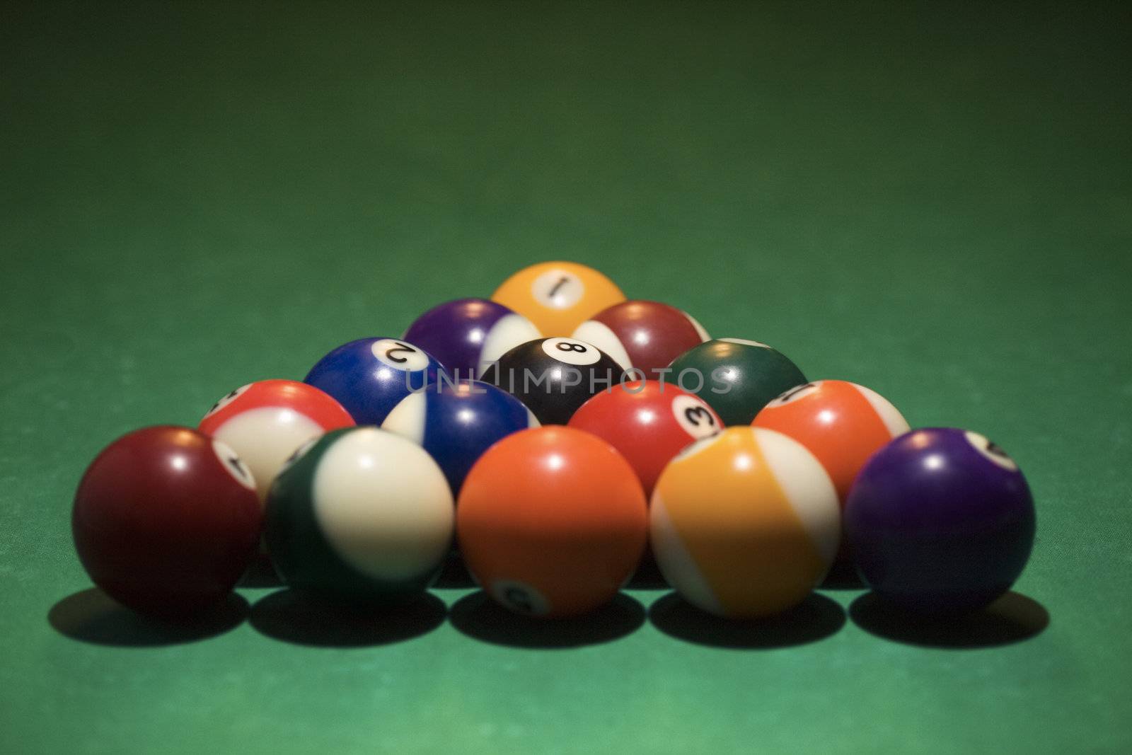Rack of pool balls. by iofoto