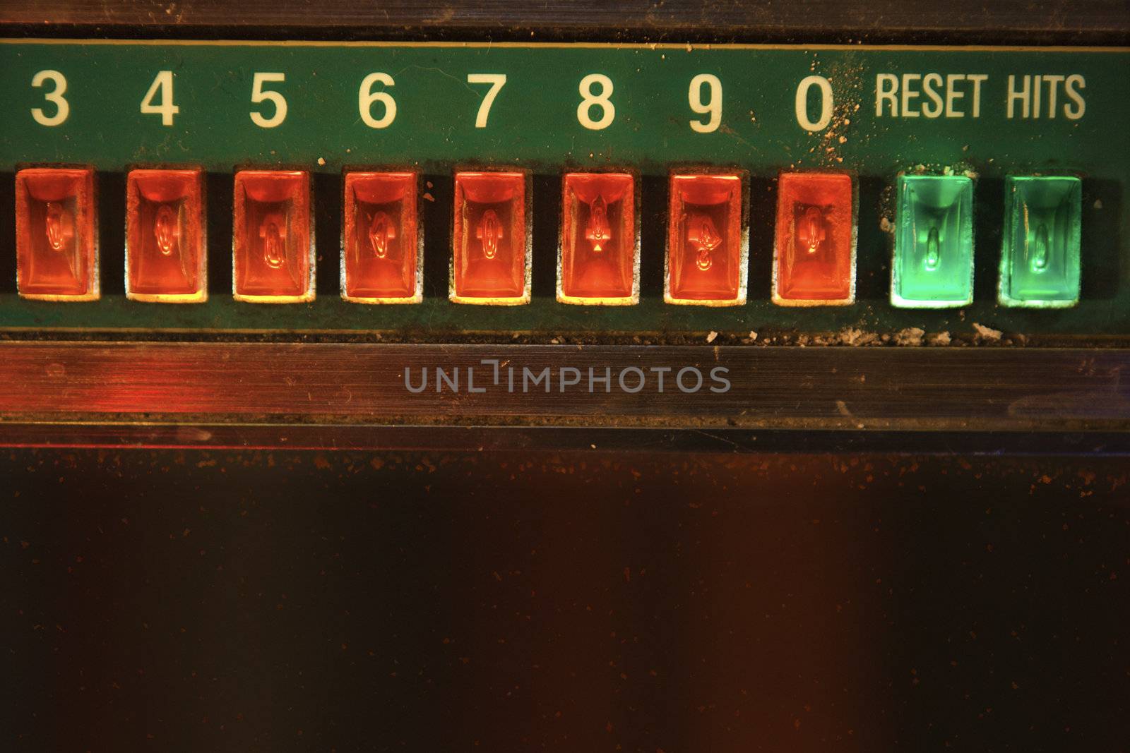 Close-up of jukebox play buttons.
