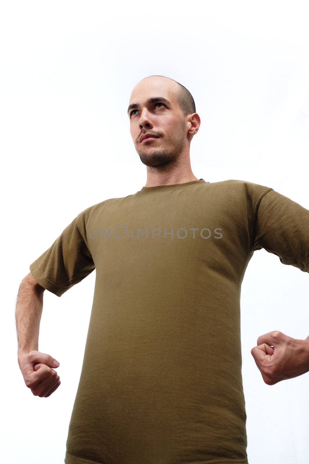 Portrait of a young man looking strong - isolated