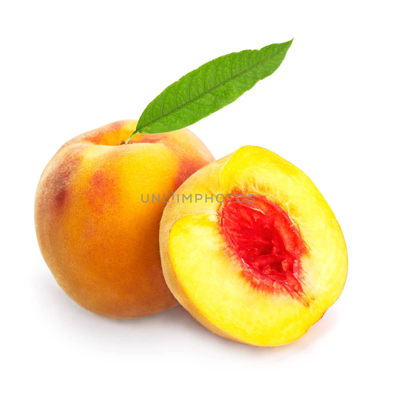 Peach with leaf. The file includes a clipping path.  Professionally retouched high quality image. 