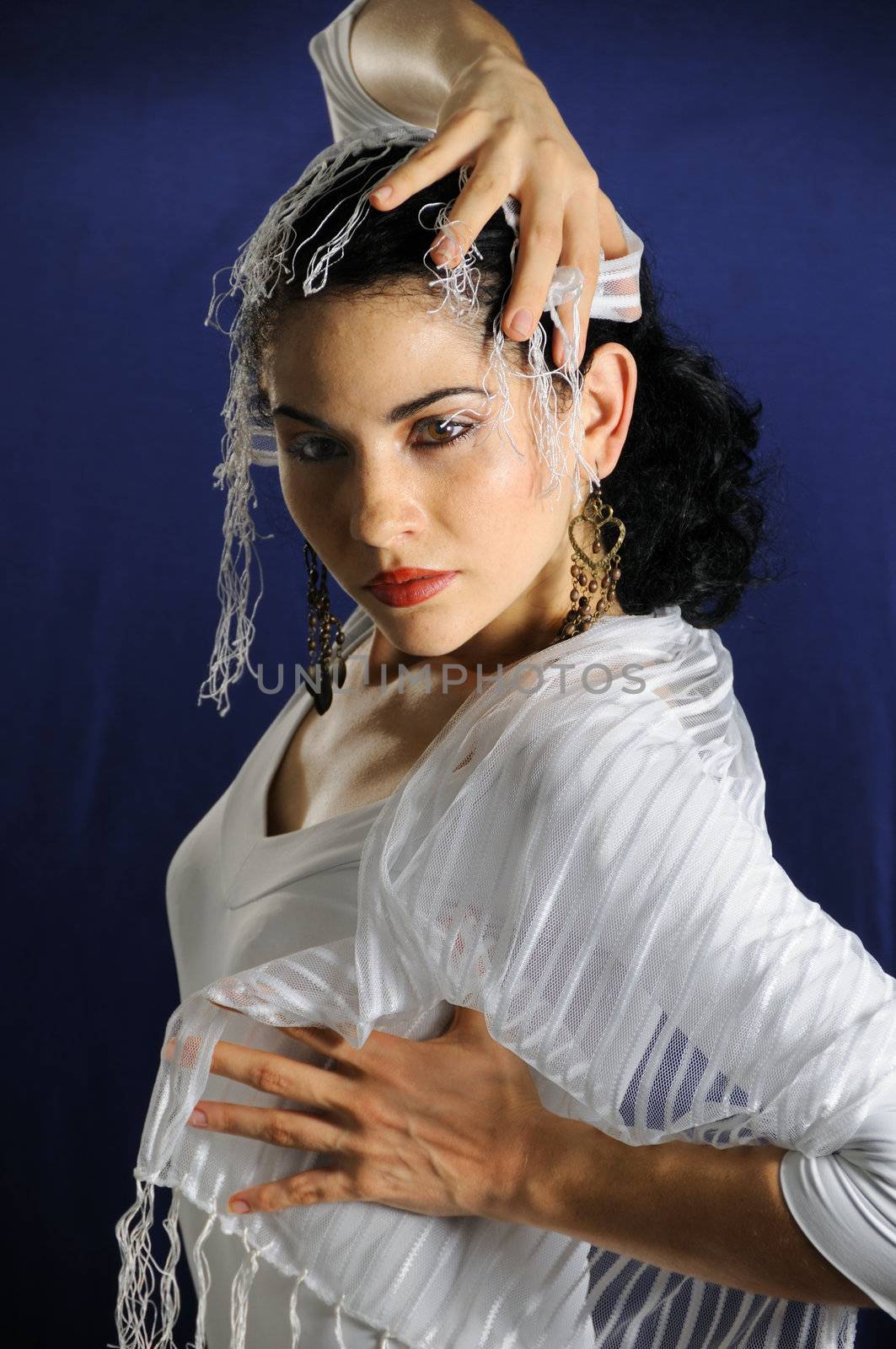 Portrait of young passionate hispanic flamenco dancer woman