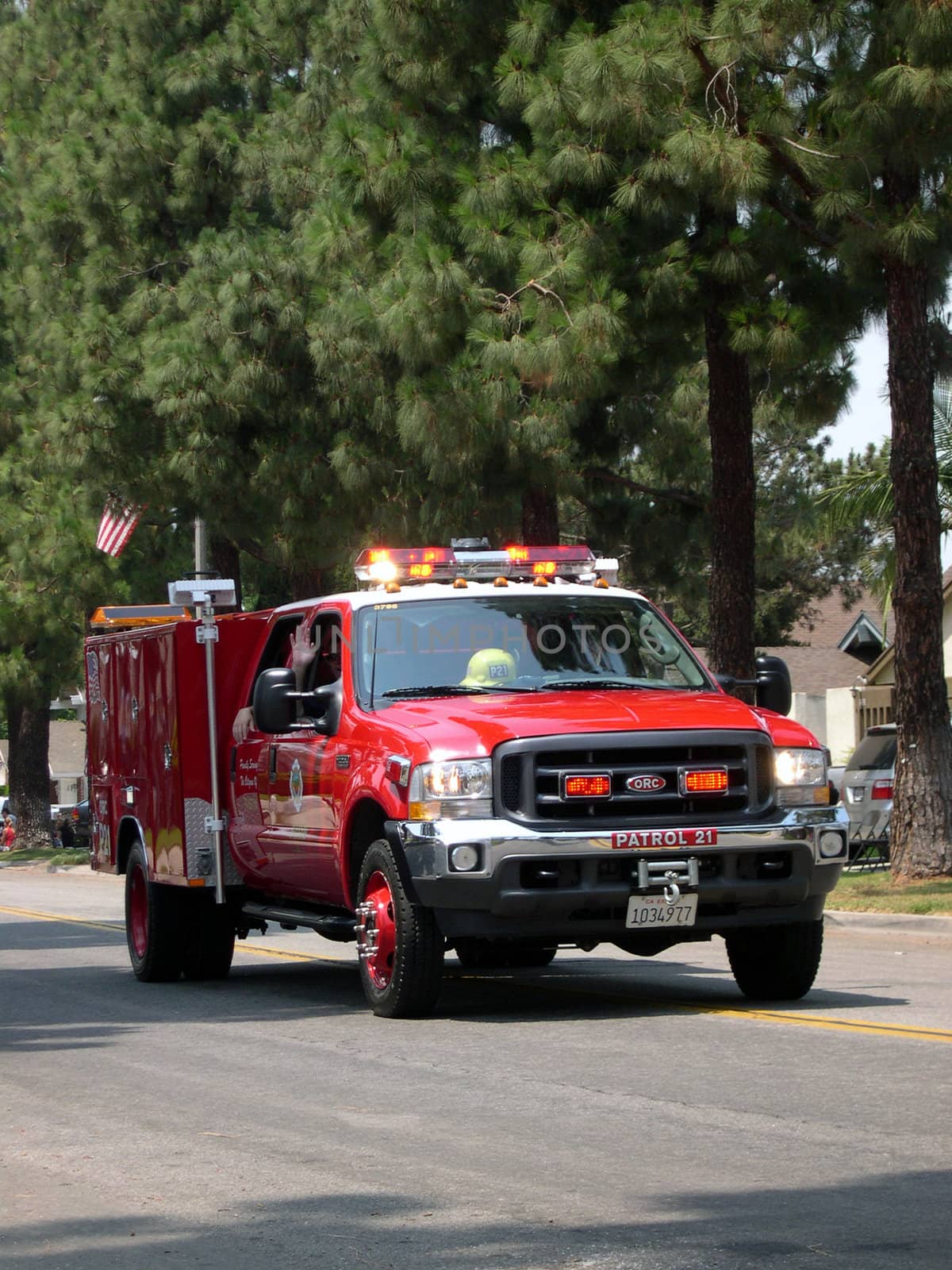 a fire rescue unit driving on a road
