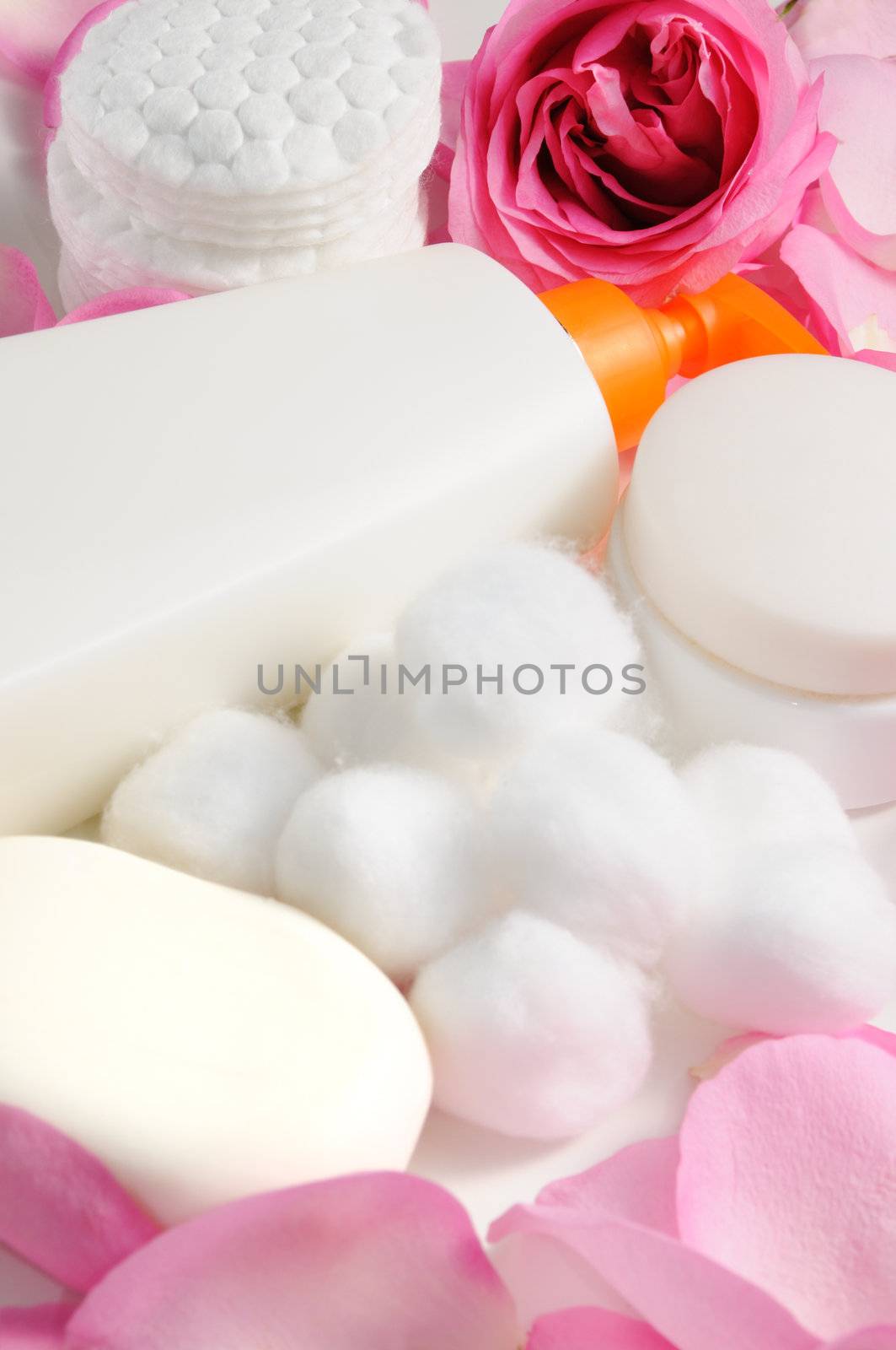 Composition of beauty and cleaning products with rose petals