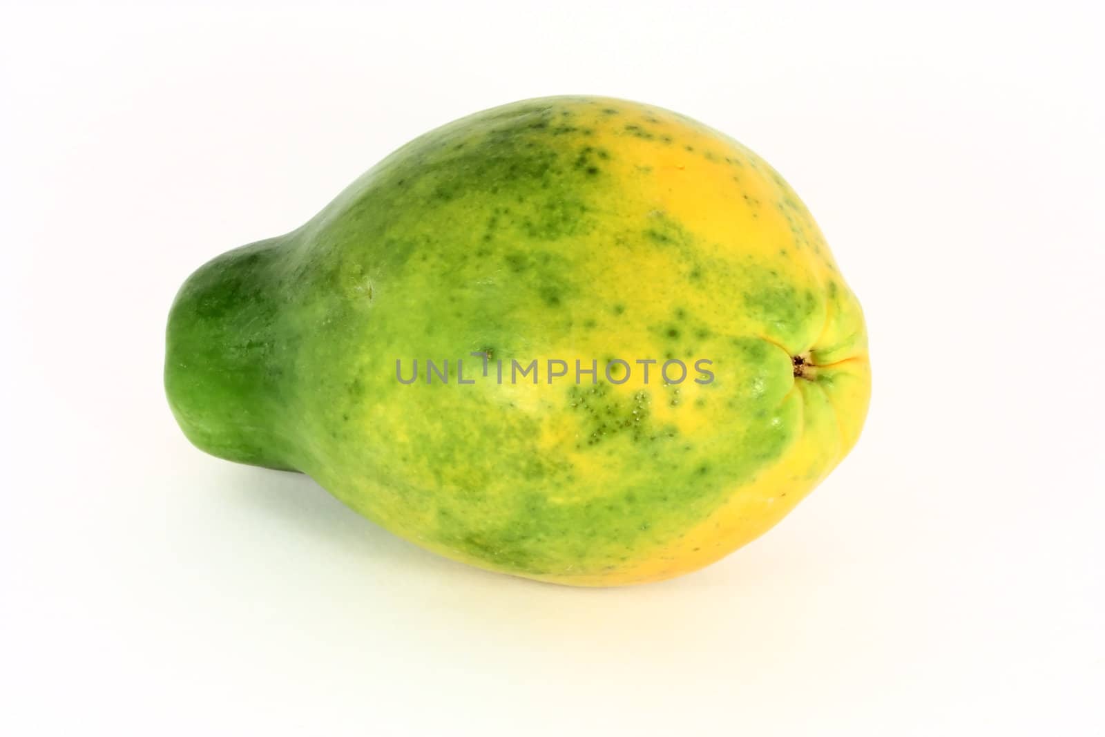 Single papaya fruit isolated on white background