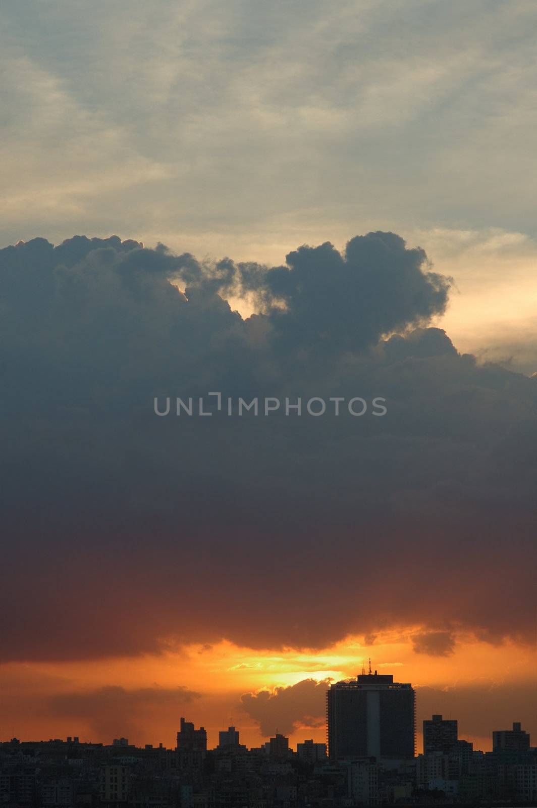 A view of Havana skyline at sunset with big dramatic clouds