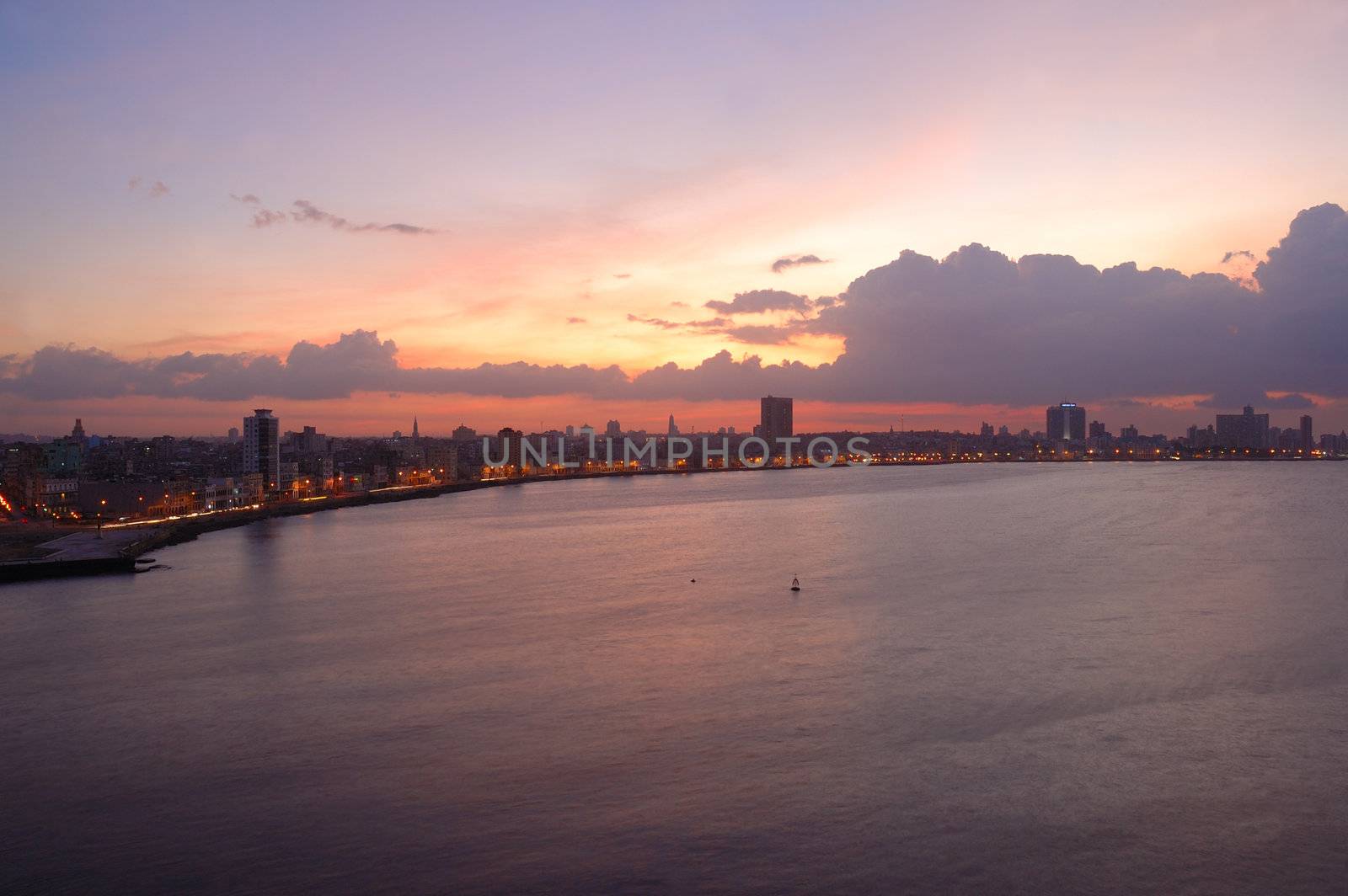 A view from Habana Bay skyline at sunset with dramatic clouds