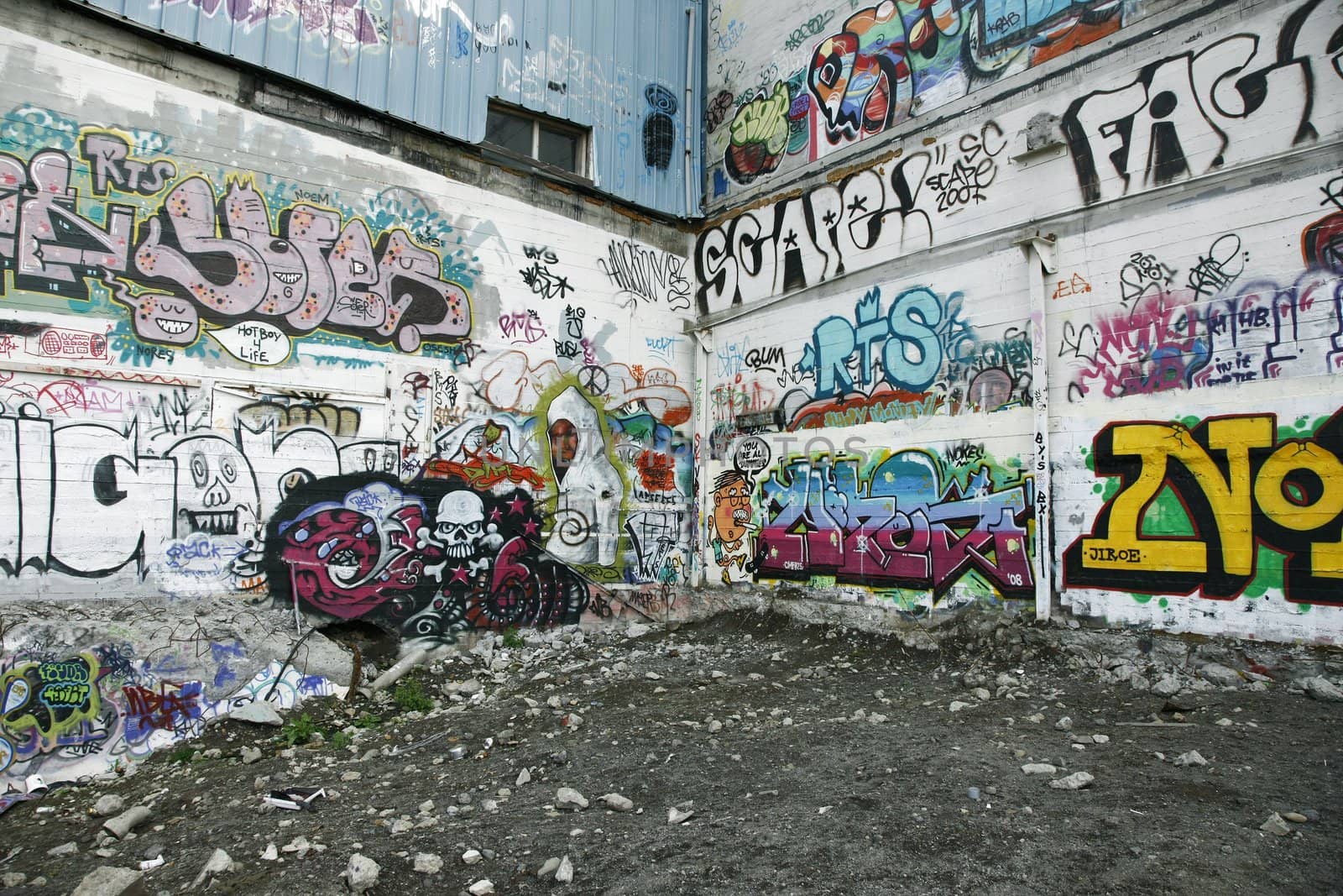 Scene from the ghetto - abandoned houses with a lot of graffiti