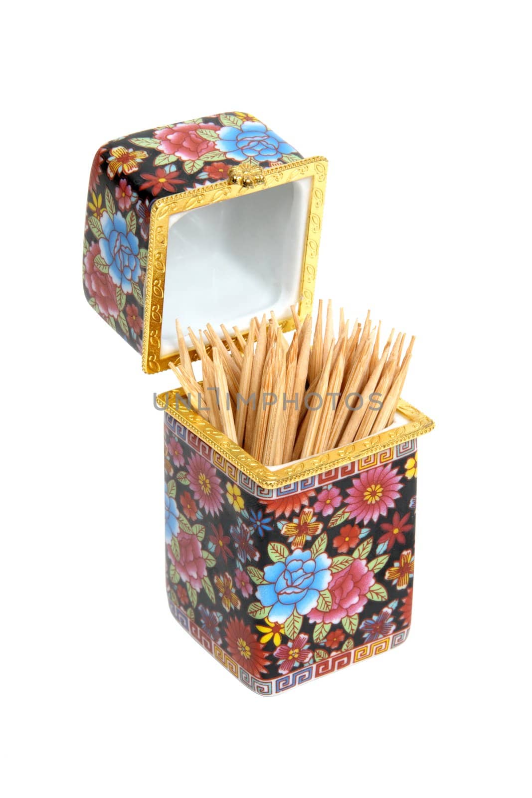 Porcelain toothpick holder decorated with bright colourful flowers, isolated on white background. Clipping path included.