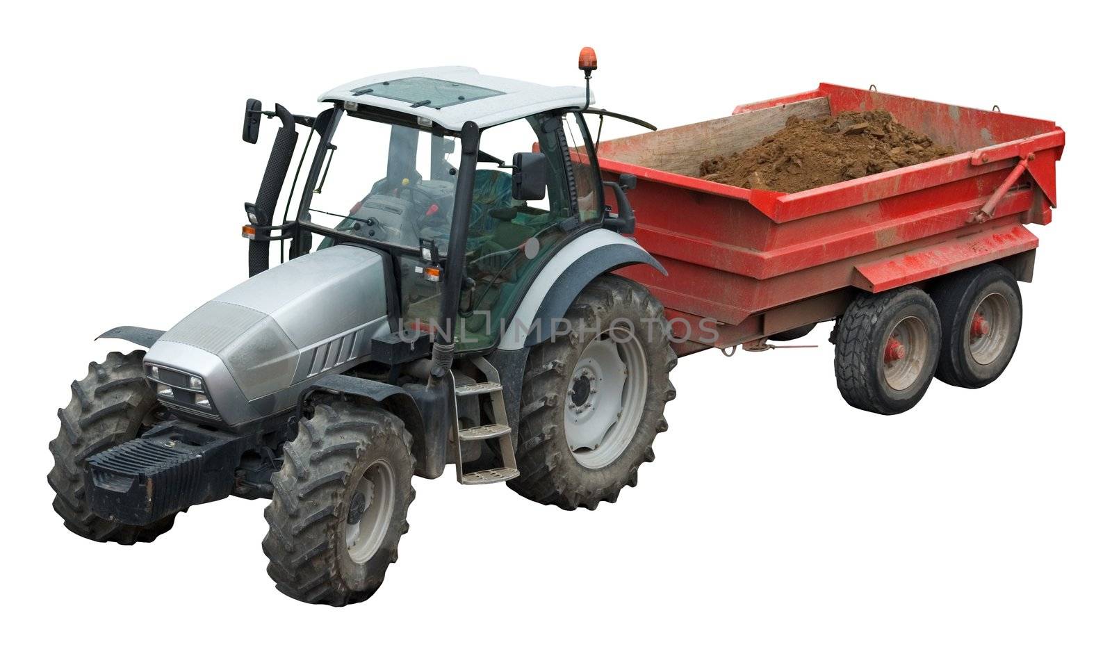 Heavy tractor pulling a trailer of dirt from a construction site (isolation on white with clipping path)