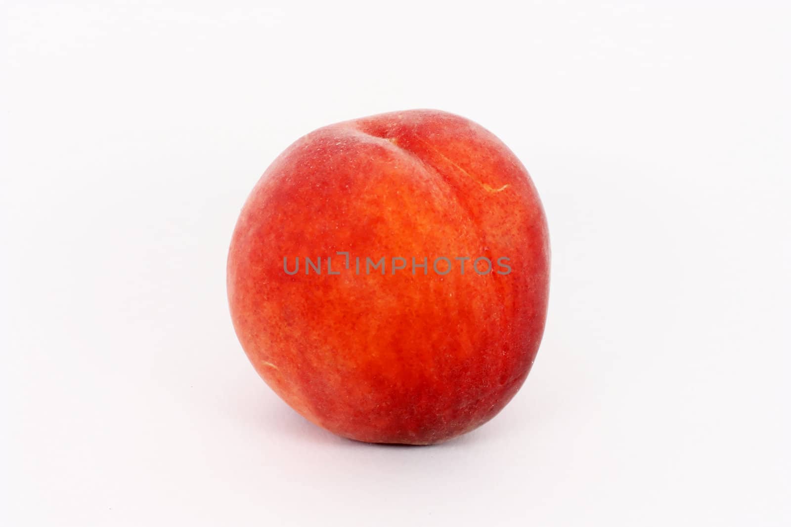 Single fresh ripe peach, isolated