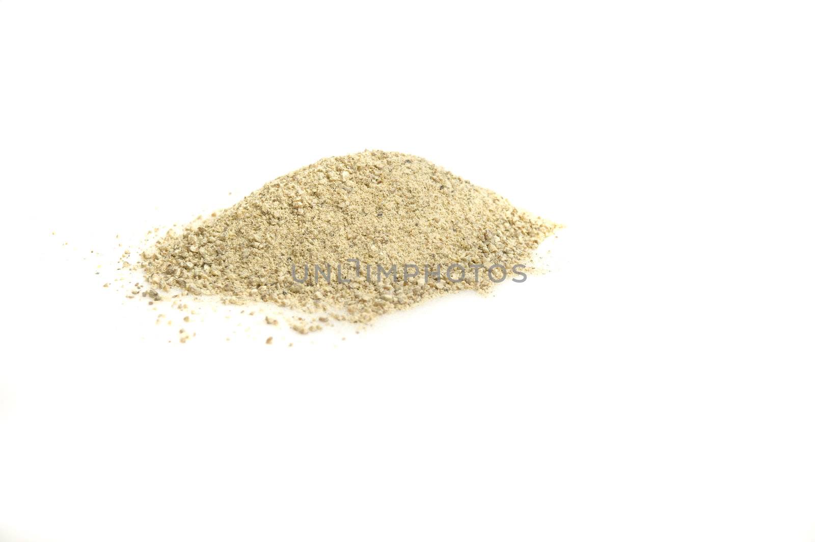 close-up on white pepper powder, isolated on white