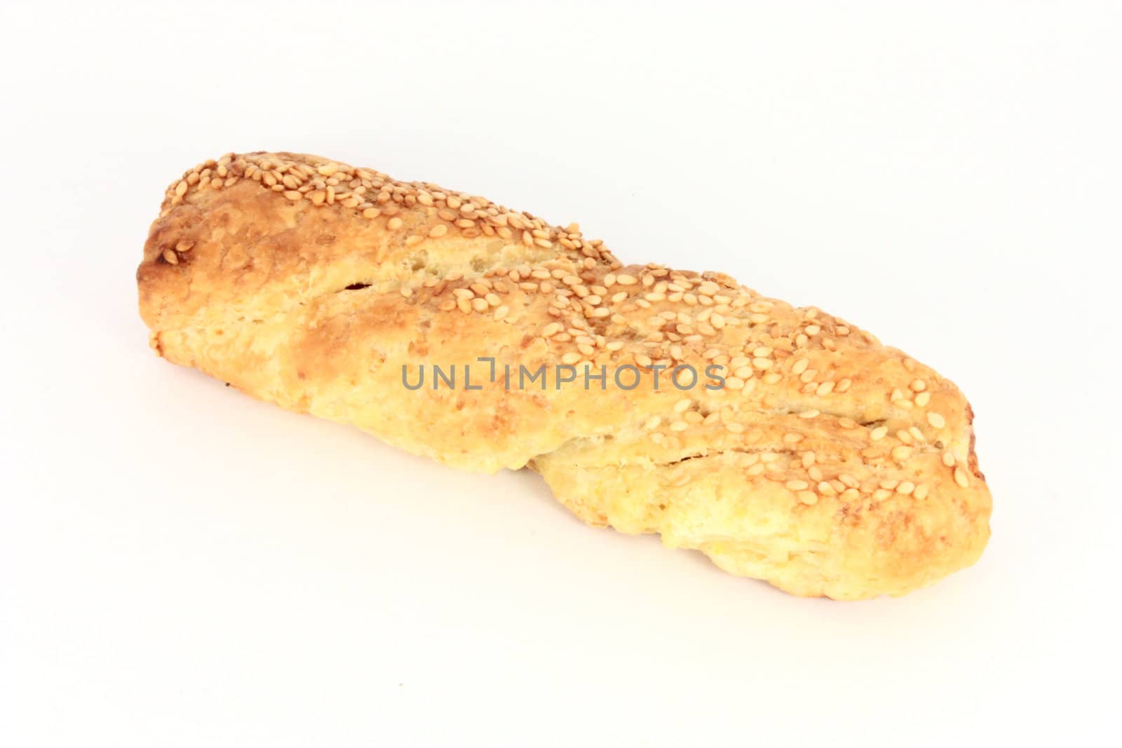 Pastry with sesame seeds, isolated on white