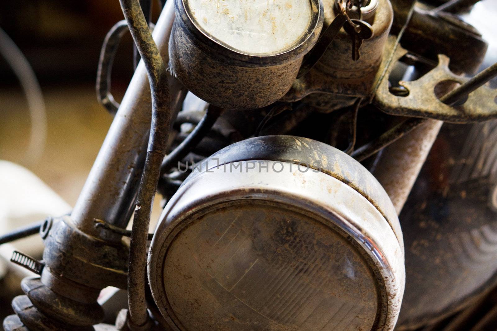 Image of an old motorbike with the aging signs 