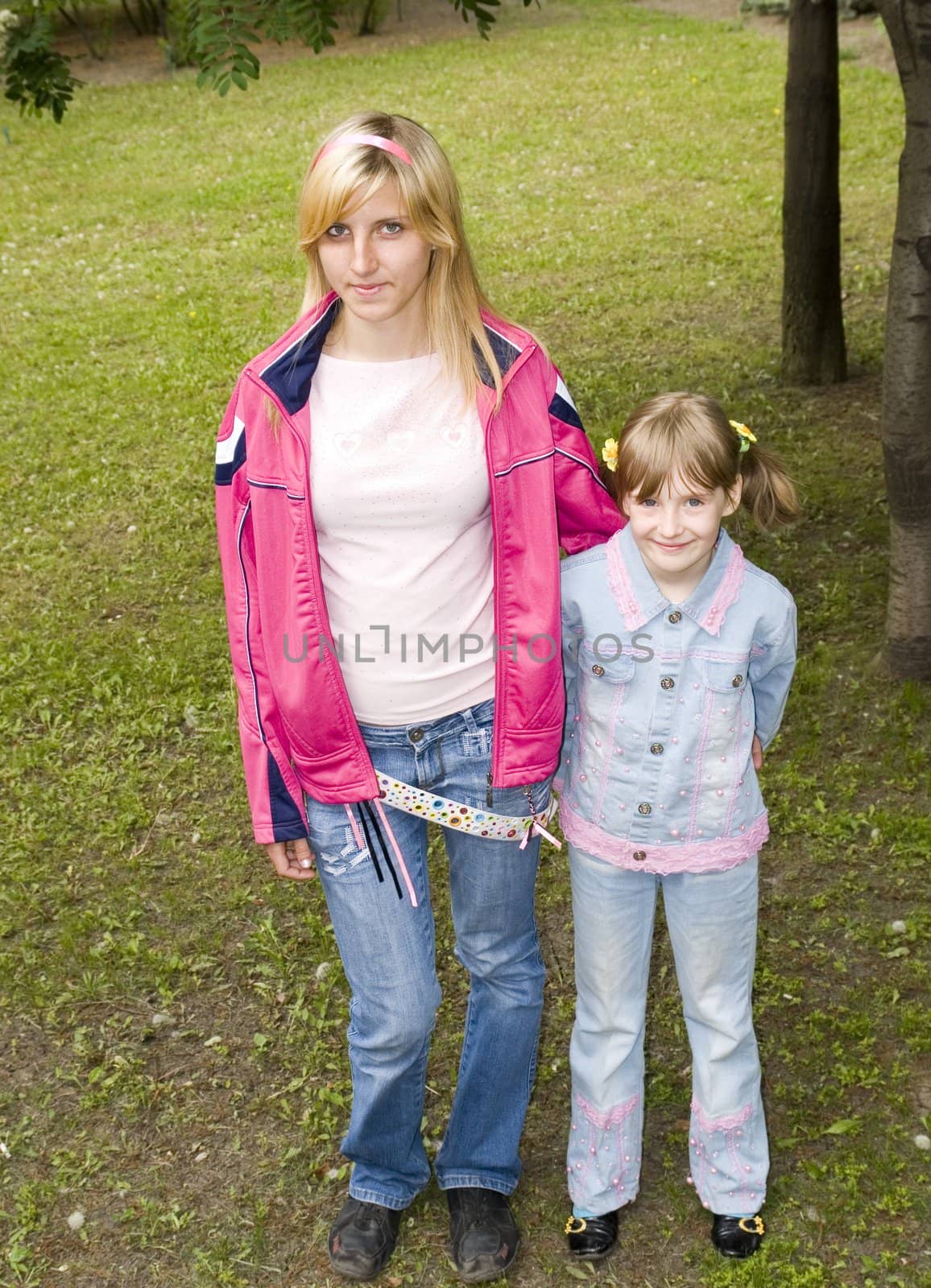 Two girls in park by Sergey_Shulgin