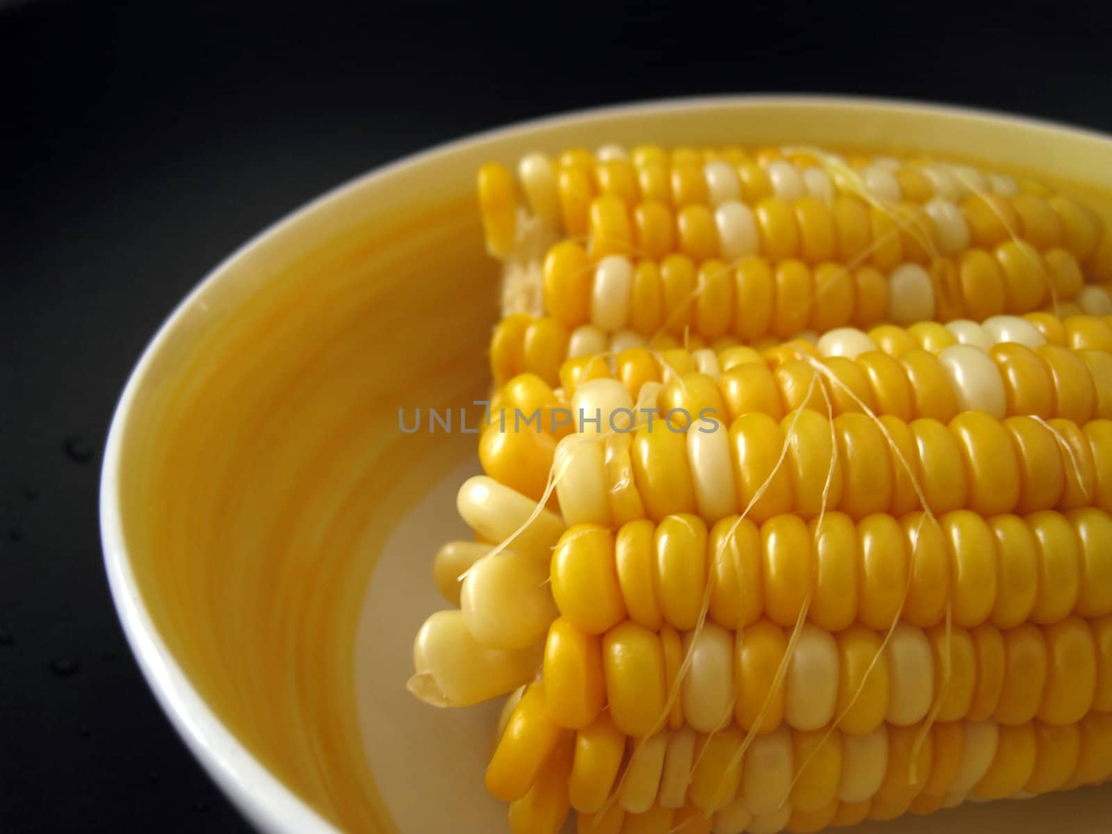 close up view for sweet corns in a bowl
