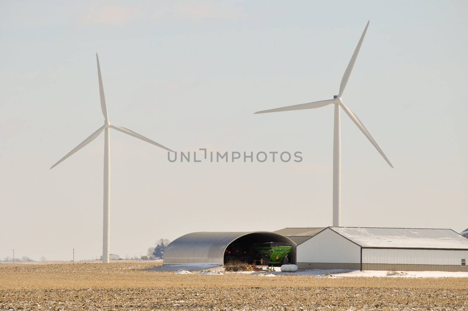 Indiana Wind Turbine over farm equipment