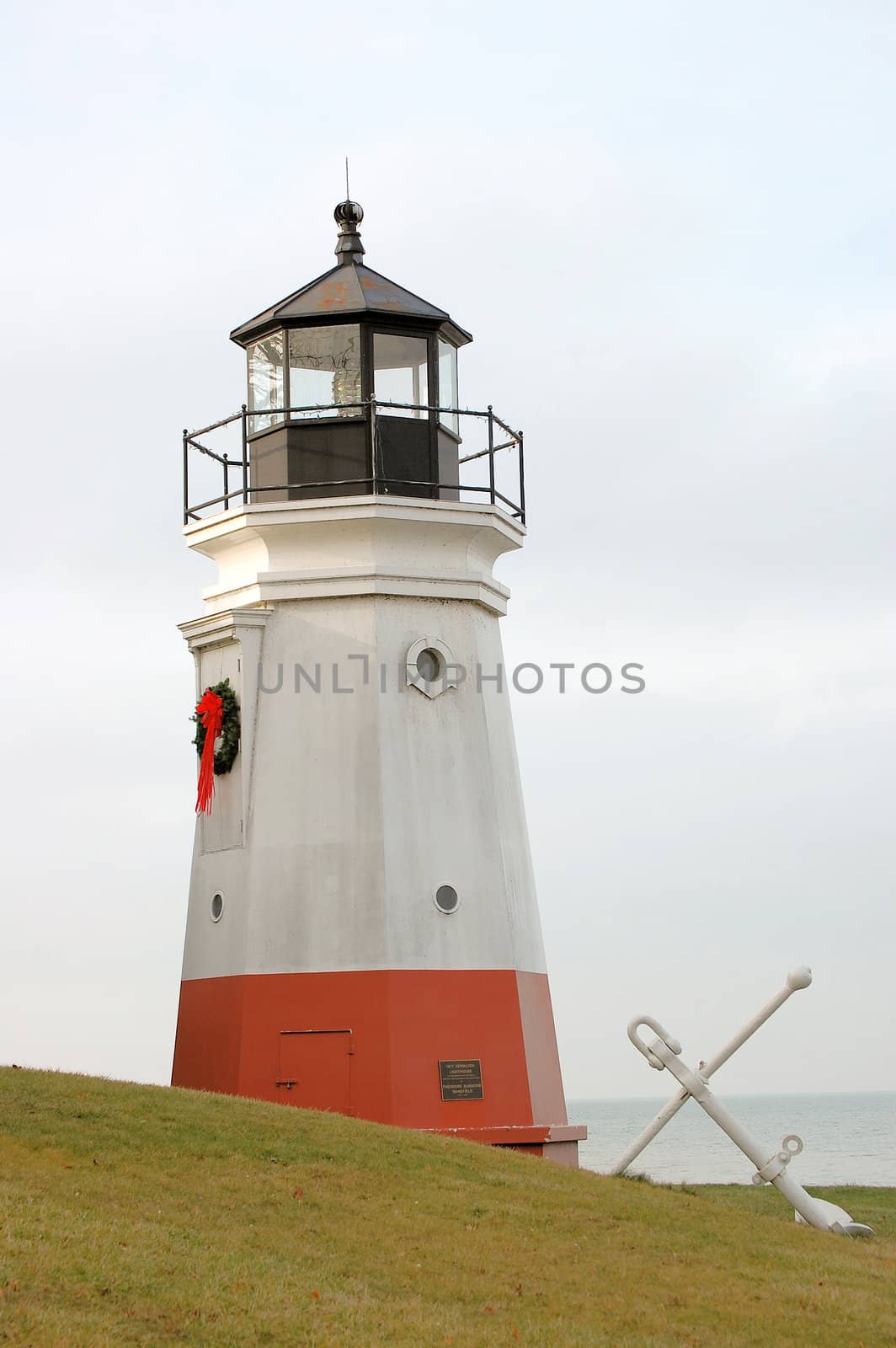 Lighthouse and anchor by RefocusPhoto