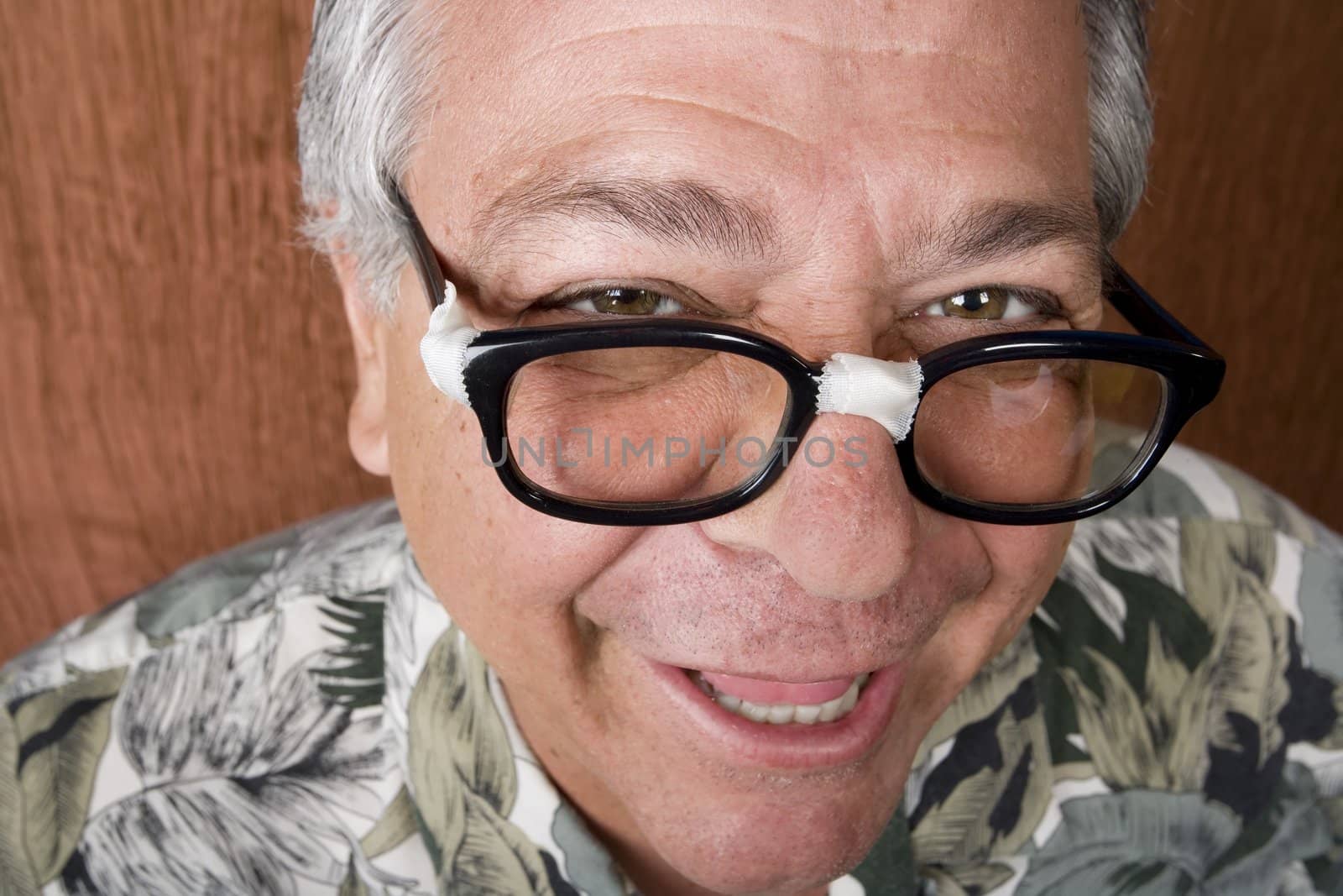 Silly Mexican-Italian Man with Taped Corrective Glasses