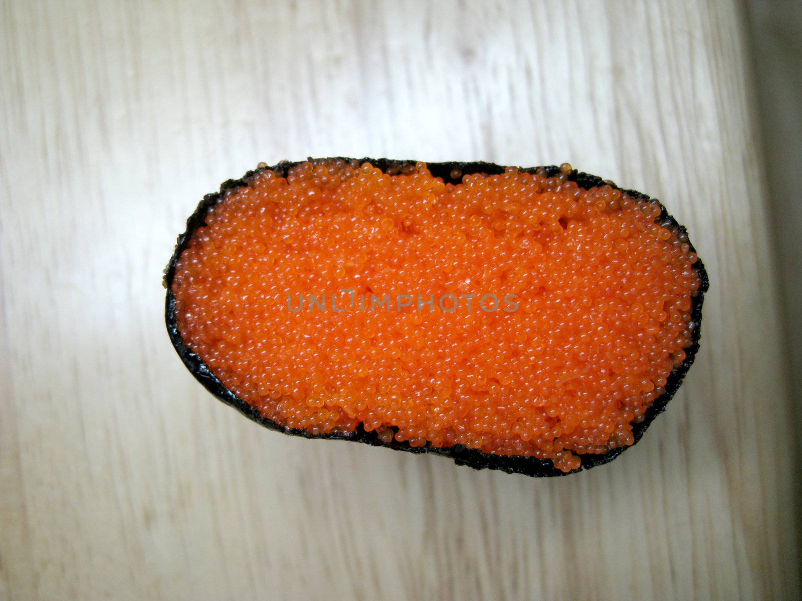 a slide of Tobiko Gunkan sushi with cliping path in photoshop