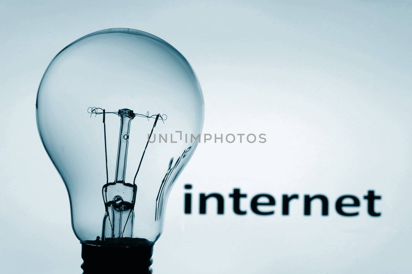 bulb on blue background showing concept of internet communication