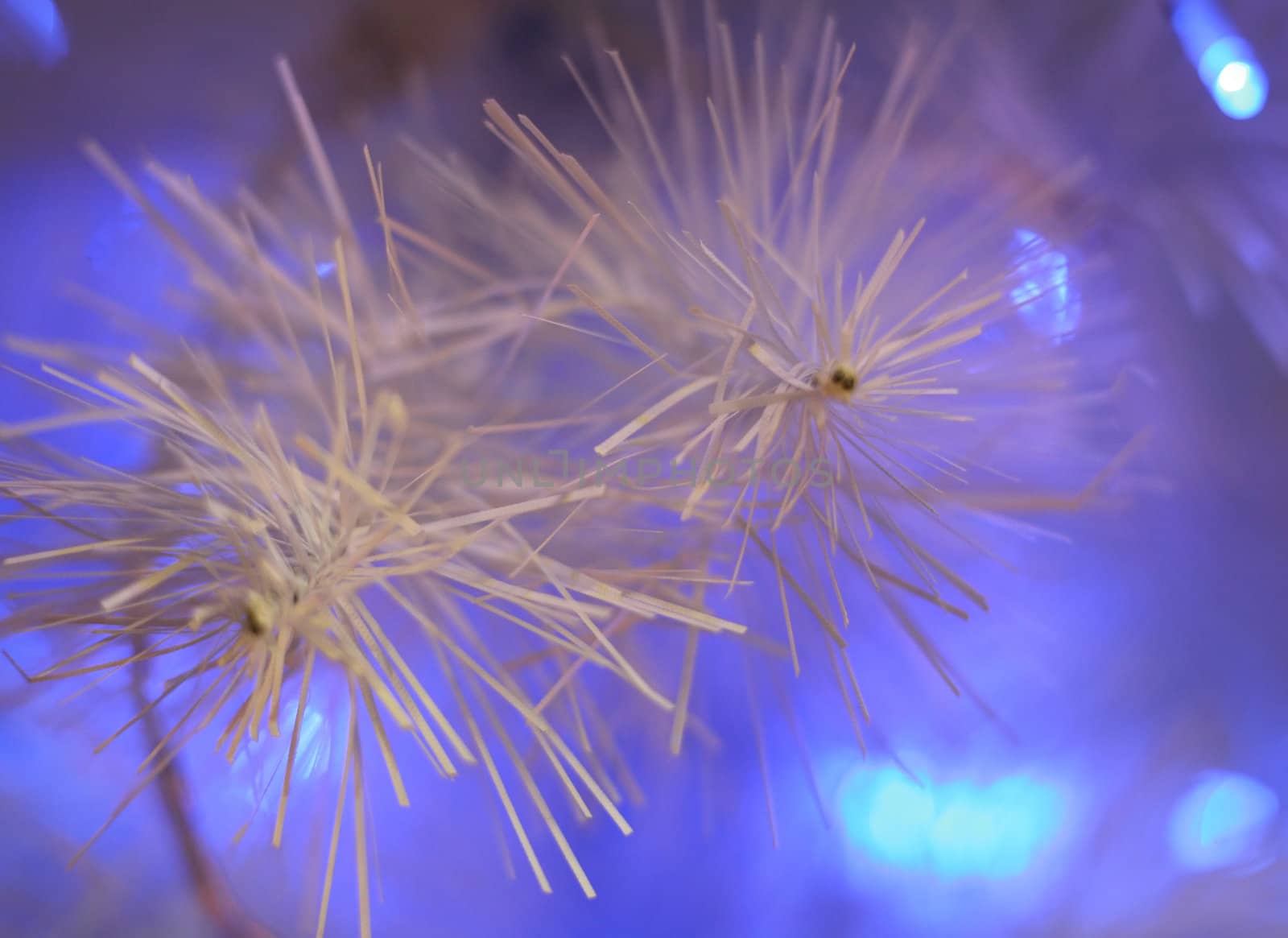 Background of an artificial white fur-tree with fires