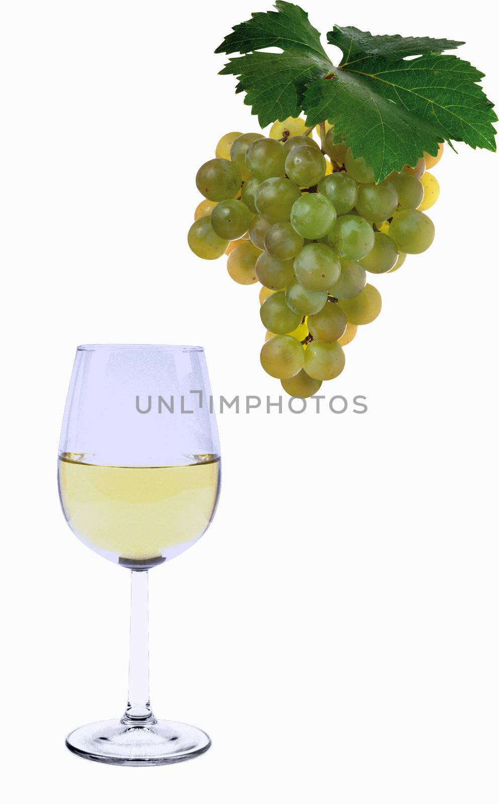 Yellow grapes and a glass of vine