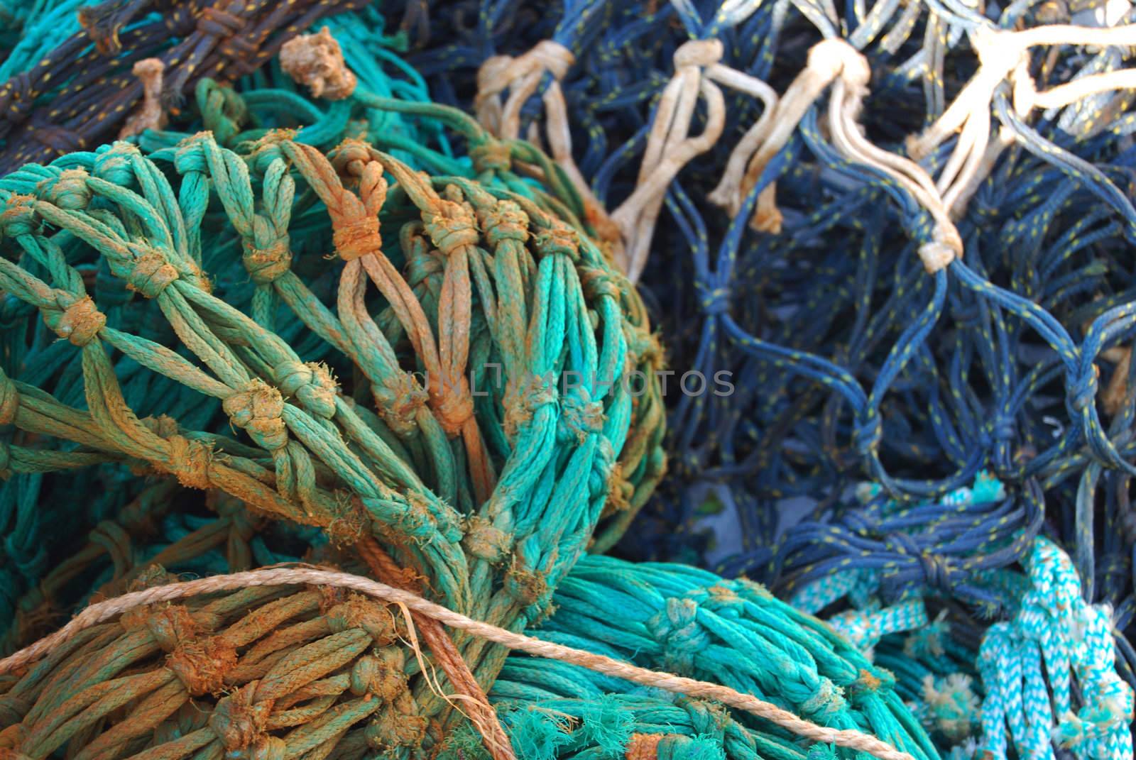 closeup of colorful fishing nets in a harbour