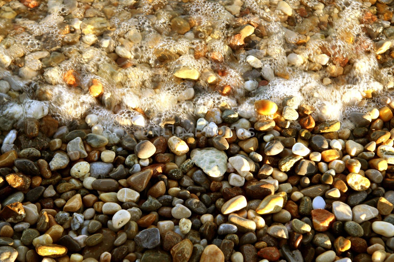 Gravel stones and foam background