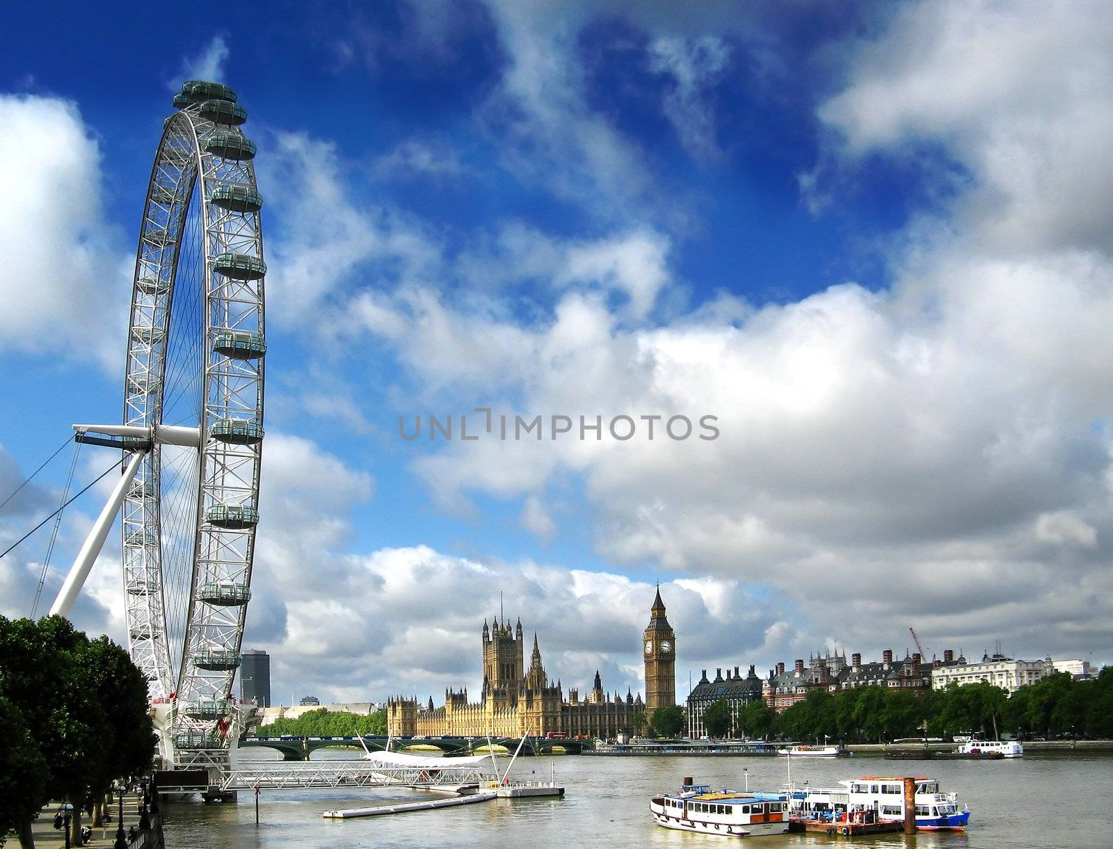 London Eye on the river Thames and Houses Of Parliment