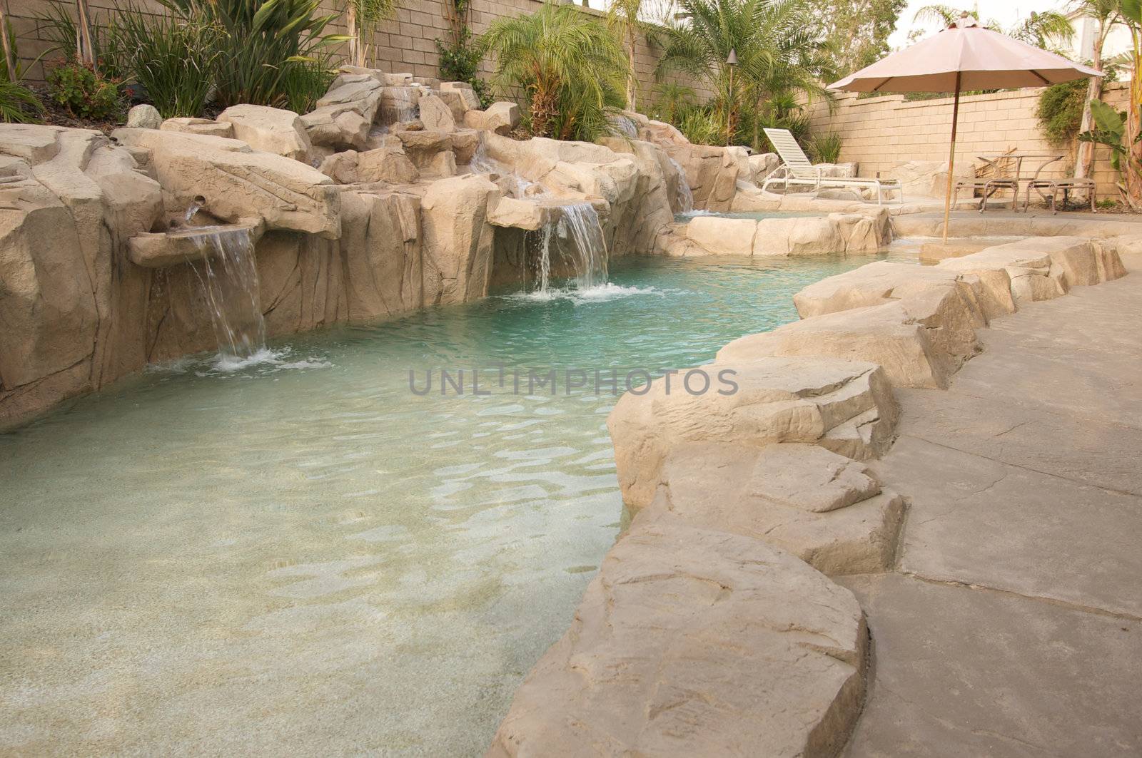 Tropical Custom Pool with waterfalls.