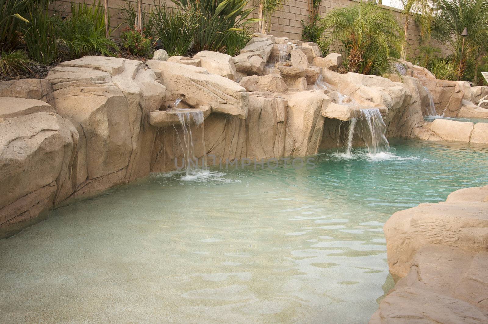 Tropical Custom Pool with waterfalls.